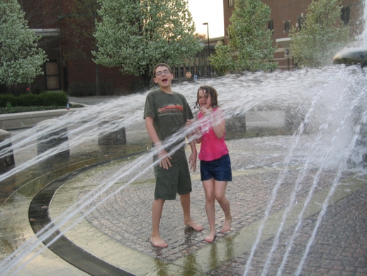 Harrison and Corinne in the fountain