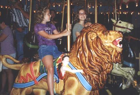 Corinne and Claire on a Merry Go Round